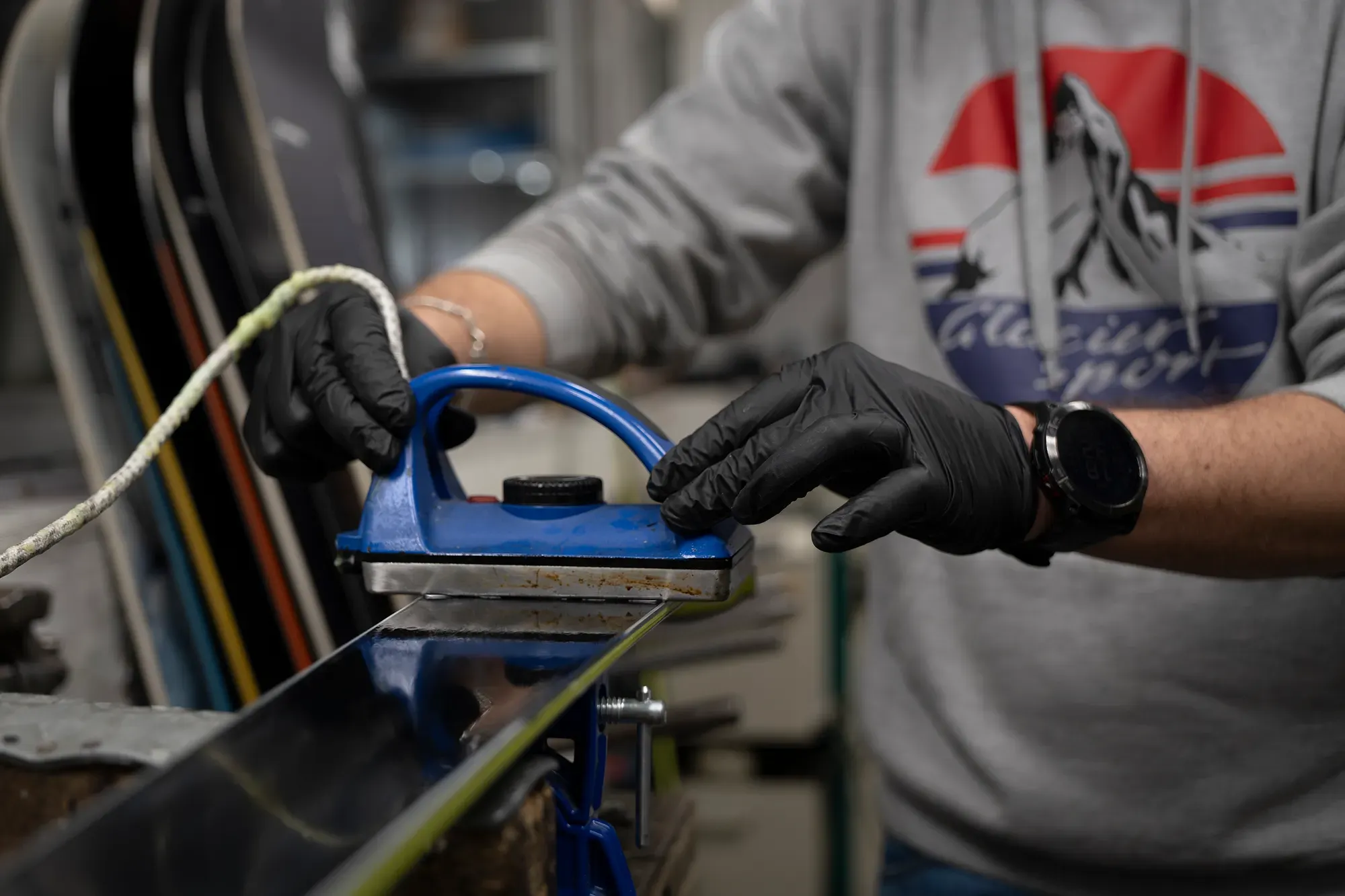 Hot wax application on ski base